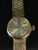 A 9ct gold lady's Omega wrist watch, 16.3g.