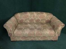 An early 20th century drop end settee