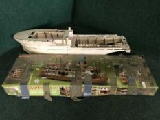 A scratch built wooden paddle steamer,