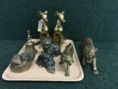 A tray of assorted brass ornaments,