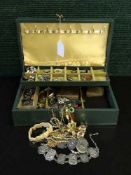 A jewellery box containing assorted costume jewellery, pearls with gold clasp, silver thimble,