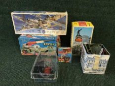 A basket of Slinky boxed Friction Dry Rocket Car,