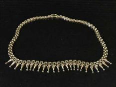 A 9ct gold Cleopatra style necklace