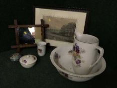 A four piece floral china toilet jug and bowl set, a lidded dish,