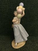 A Lladro figure - girl with balloons