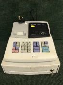 A Sharp XE-A 102 cash register with keys