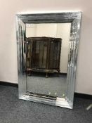 An all glass contemporary mirror