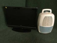 A Goodmans 26 inch LCD TV with remote and a de-humidifier