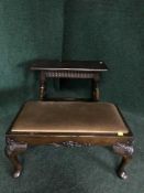 An oak stool and a walnut footstool