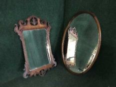 An Edwardian framed mirror and Chippendale style mirror