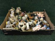 Two boxes of assorted character jugs, figures,