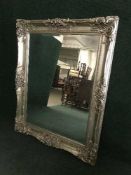 A large ornate framed mirror