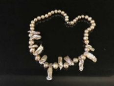 A pink keshi pearl necklace with magnetic clasp