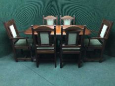 A mahogany dining table and six chairs