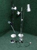 Four metal standard lamps