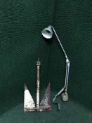 An angle poised lamp and an anchor