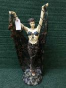 A large Art Deco style figure