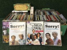 Two boxes of cds and dvds