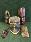 Five wooden tribal masks