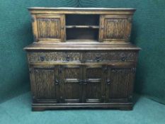 An oak buffet back sideboard