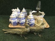 A tray of Ringtons caddies, Aynsley vase,