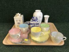 A tray of Ringtons caddies, Wedgwood vases,