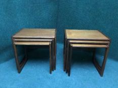 Two nests of teak tables