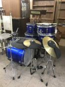 An eight piece performance percussion drum kit
