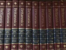 Three boxes of Encyclopedia Brittanica books