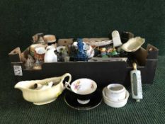 A box of glass bottles, beer steins,