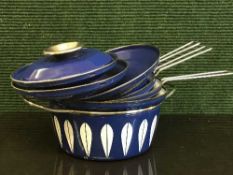 Four Catherine Holm of Norway blue lotus saucepans and lids