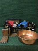 A box of copper pans, wooden bookends, vases,