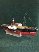 A model paddle steamer boat