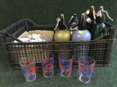 A box of glass ware and soda syphons