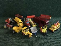 A crate of die cast farm vehicles