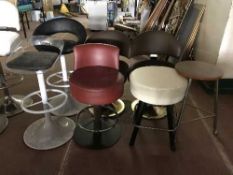 A teak dining table and four chairs