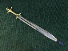 A gilt handled ornamental short sword