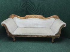 A pine framed scroll arm settee