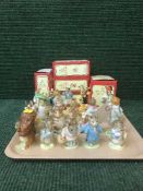 A collection of early gold backstamp Beatrix Potter figure and Doulton Bunnykins (some damages)