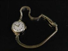 Gold Rolex Tudor Royal lady's wristwatch on gold Rolex bracelet
