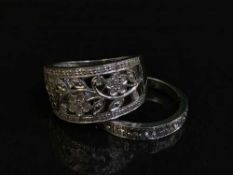 Two 18 carat white gold diamond set rings 9 grams