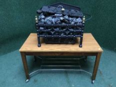 A teak coffee table and coal effect electric fire