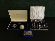 A set of silver spoons,