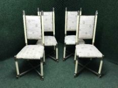 A set of six metal and upholstered dining chairs