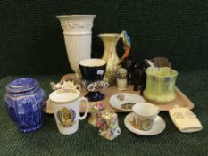 A tray of Wedgwood vase, Poole dish, Elephant ornament,