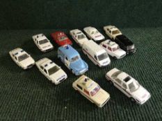 A crate of die cast police vehicles