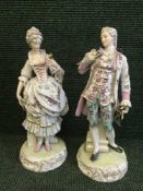 A pair of Dresden style porcelain figures