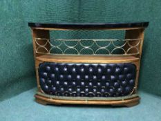 A 1970's teak bar with vinyl upholstered front