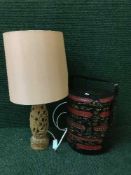 An oriental basket, carved table lamp,