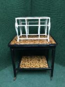 A painted two tier trolley and a tiled topped mag rack